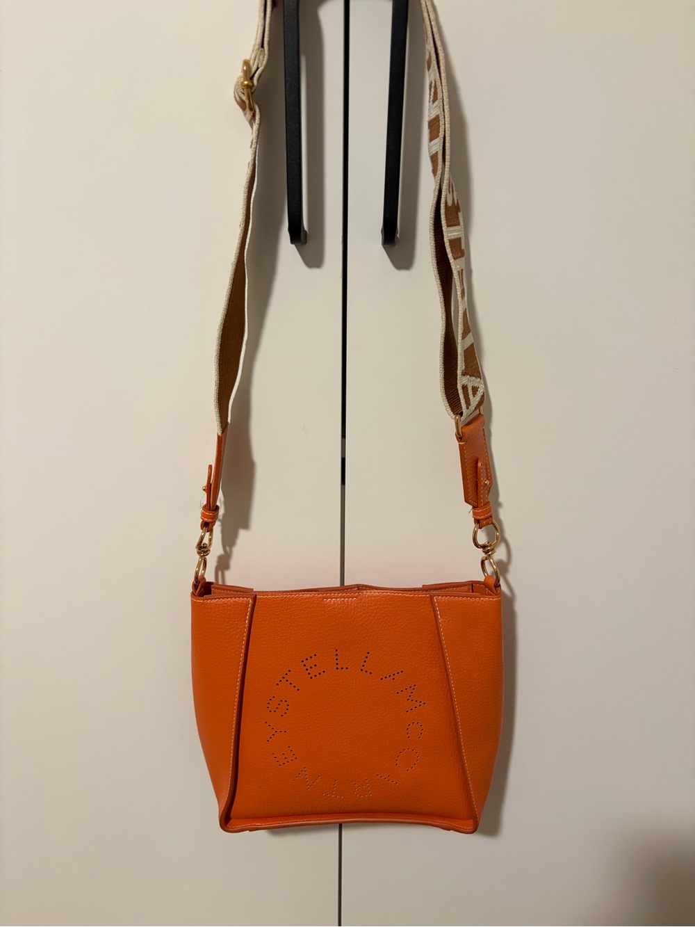 Stella McCartney Orange Perforated Logo Crossbody with Branded Strap